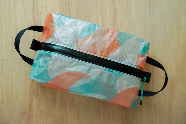 perm and baton Center Zip SACK M