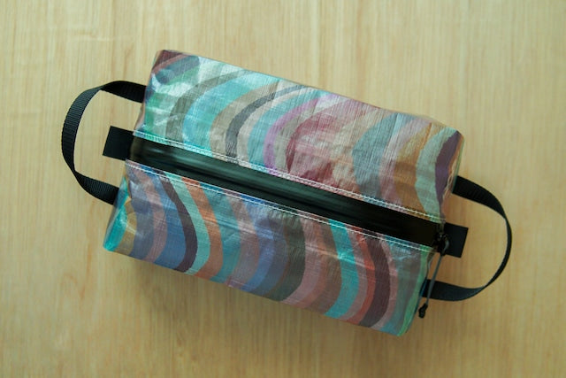 perm and baton Center Zip SACK M